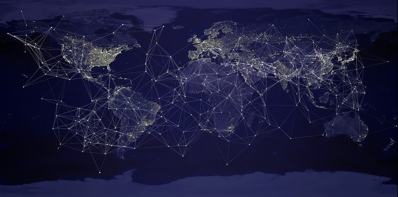 World map with interconnected network lines representing global connectivity.