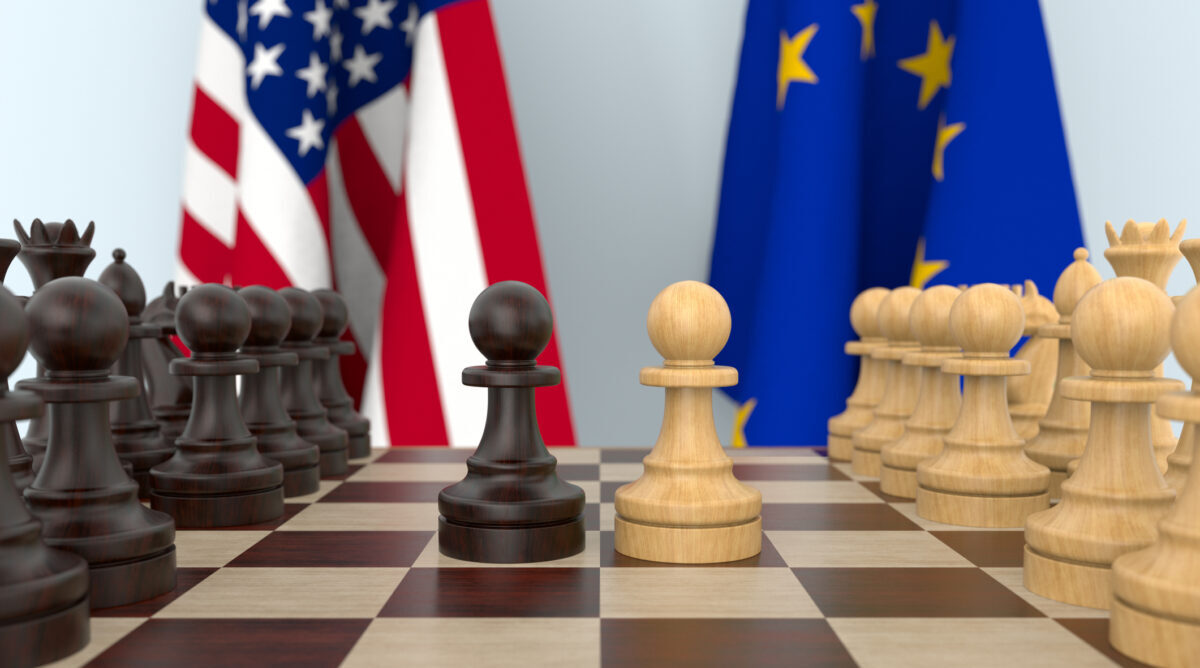 Flags of United States and EU behind chess board. The first pawn moves in the beginning of the game. 3D illustration
